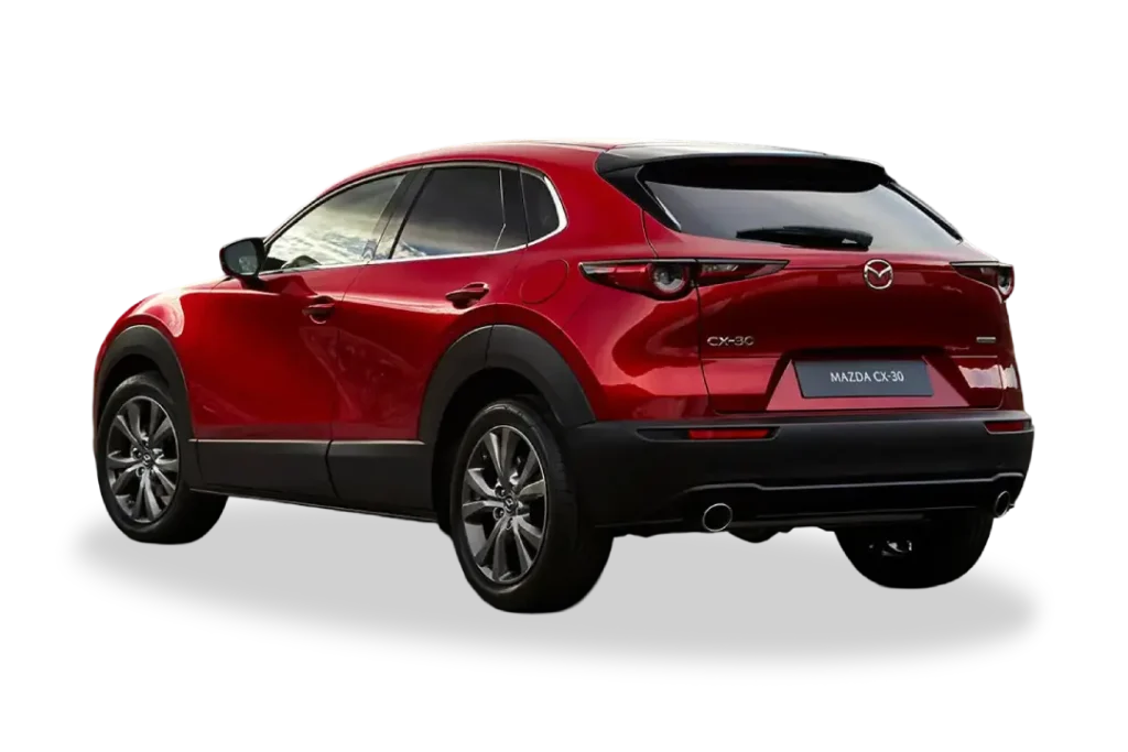 Mazda CX-30 rojo visto desde la parte trasera, SUV compacto aparcado en exterior para oferta de renting